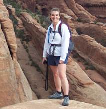 Dr Wing stands on a sandstone fin in Arches Natl Park.